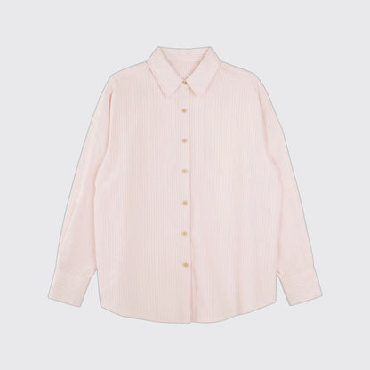 Blusa a rayas con textura y hombros caídos