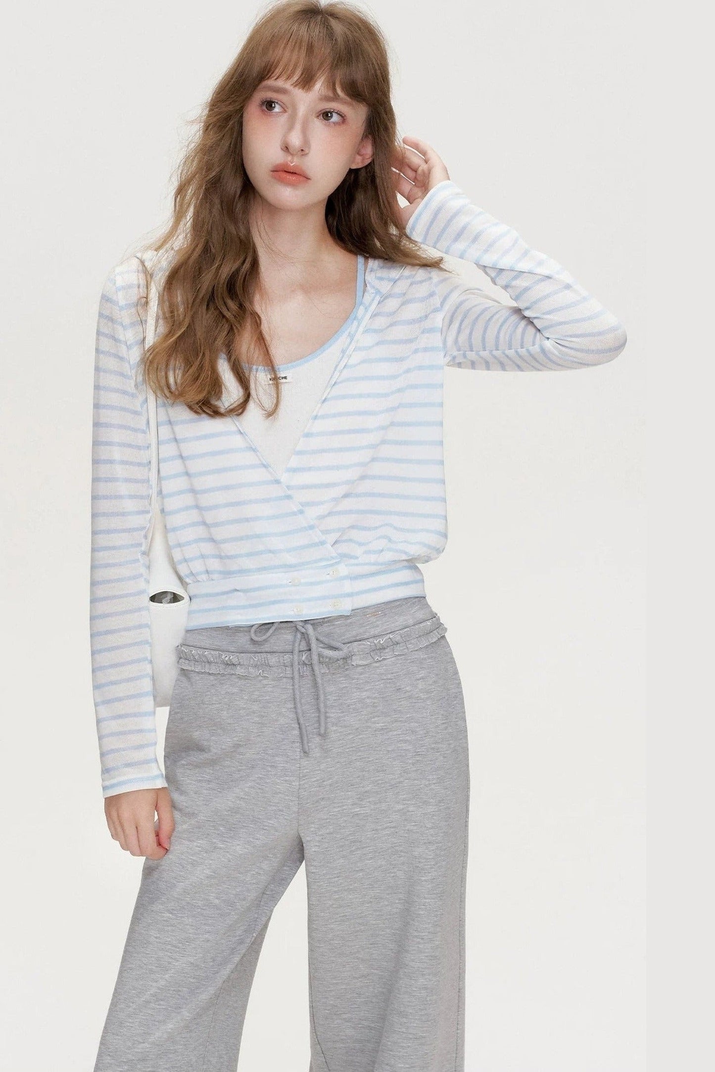 T-shirt a righe a maniche lunghe con scollo a V incrociato