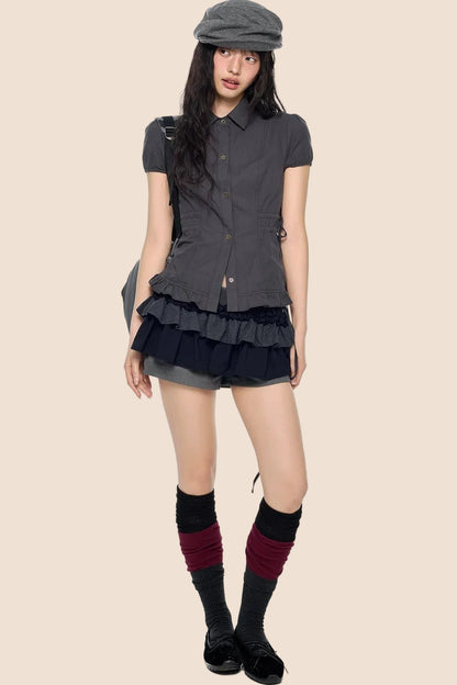 Blouse à manches bouffantes avec lacets