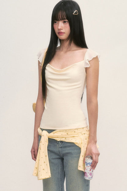 Top con cuello drapeado y mangas con volantes