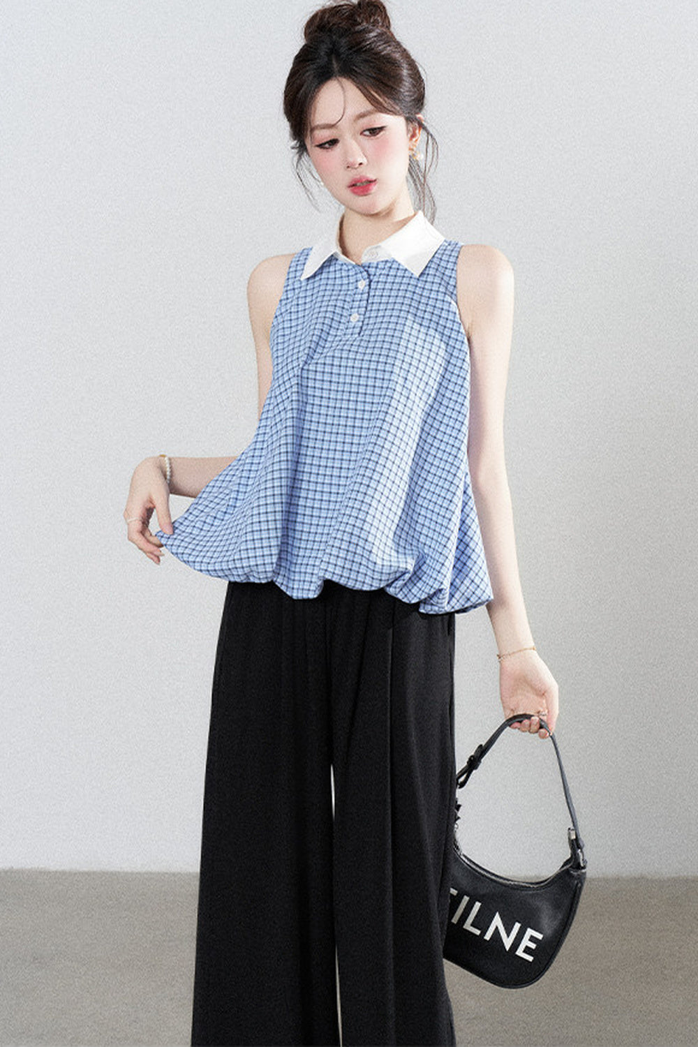 Blaue karierte Halter-Bluse