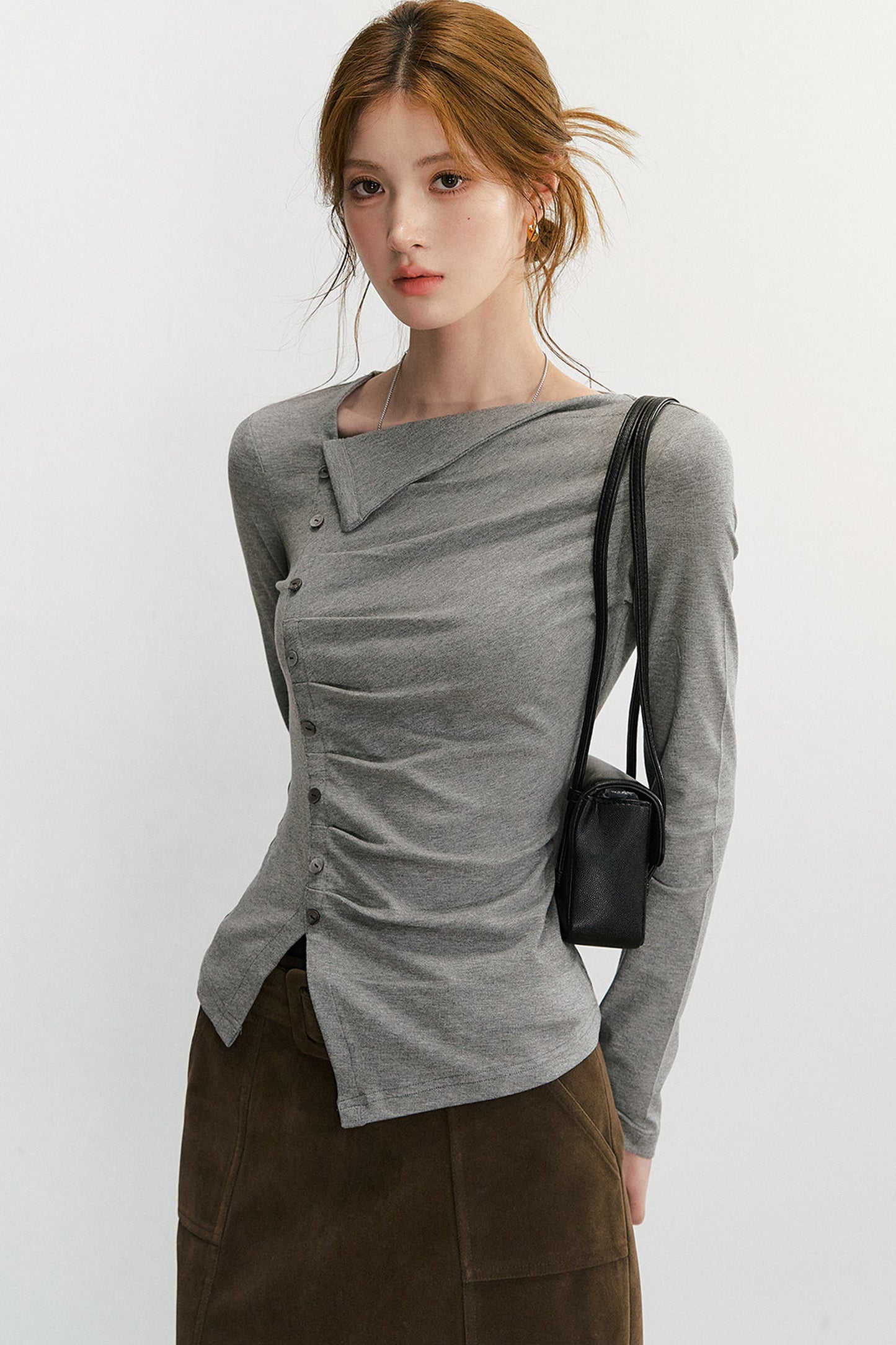 Asymmetrisches langärmeliges Strickoberteil