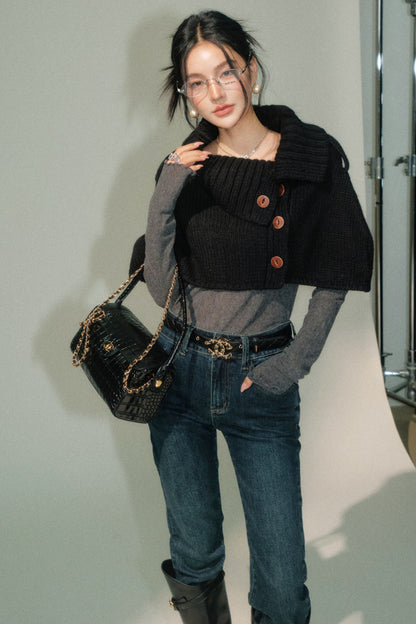 Completo mantella in maglia con revers asimmetrico e pantaloni