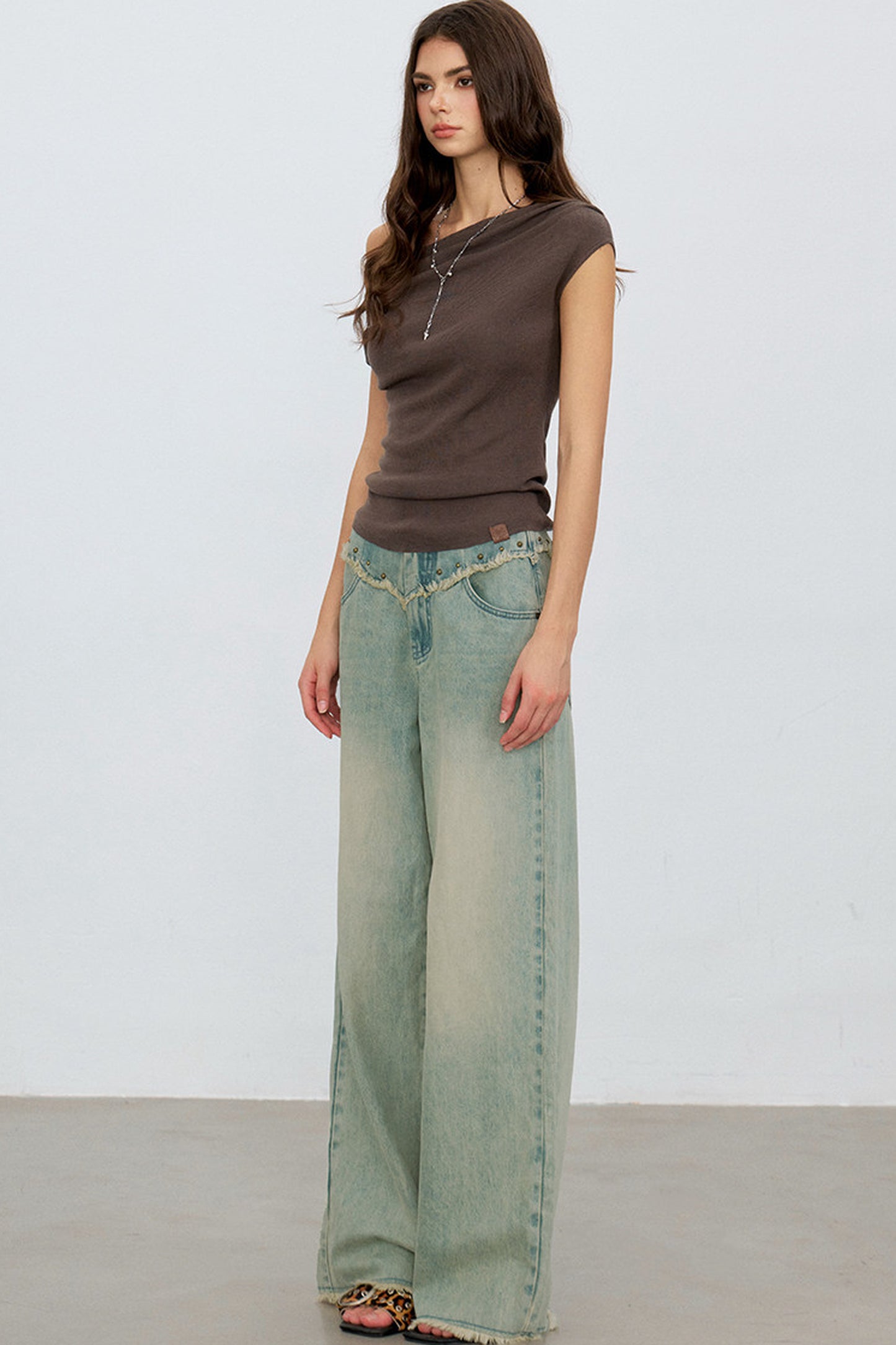 V-Shaped Raw Edge Rivet Denim Pants