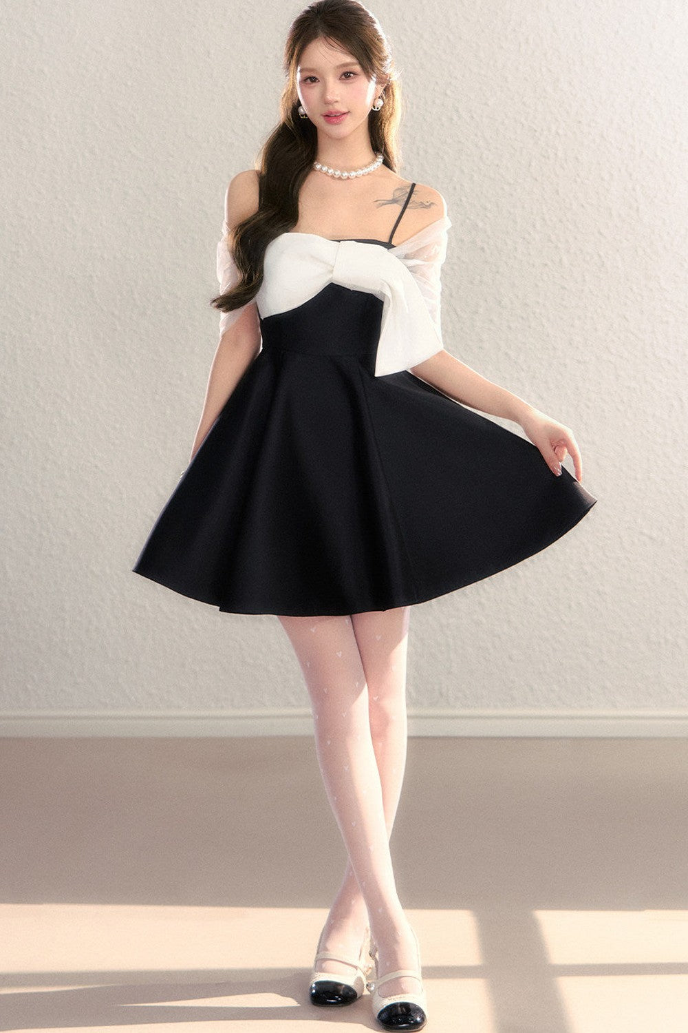 Abito da sera in tulle con spalle scoperte