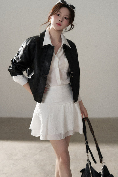 Giacca corta in pelle PU con revers