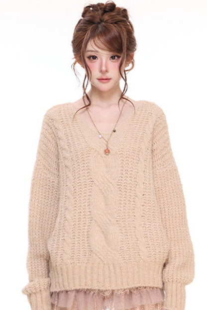 Pull ample en maille torsadée à col V