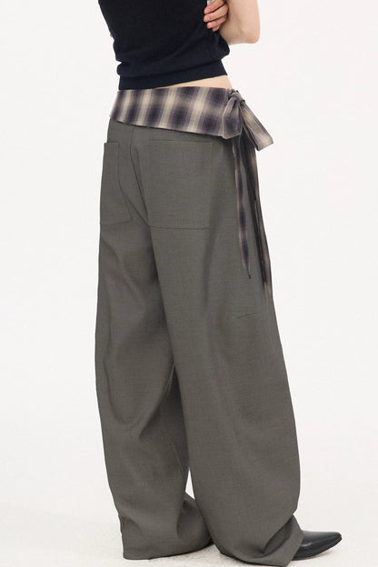 Pantalon à carreaux avec ceinture à nouer