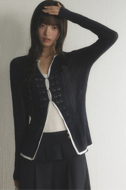 Ensemble cardigan et pantalon en maille à découpes et bordures contrastées