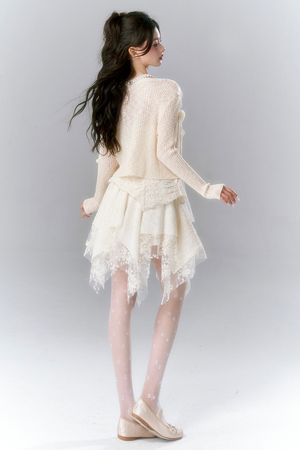 Pompon-Strickjacke