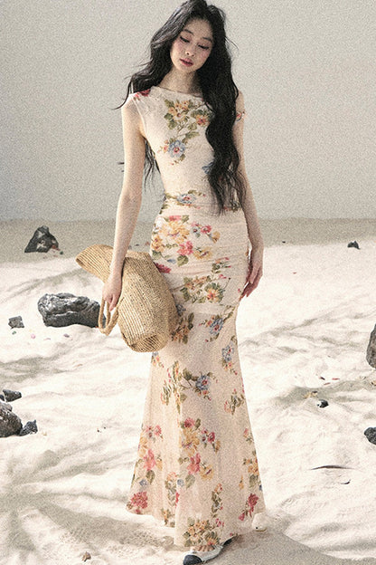 Sommerkleid aus Netzstoff mit Blumenmuster und Fischschwanz-Saum