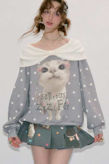 Sudadera gris con estampado de gato y lunares