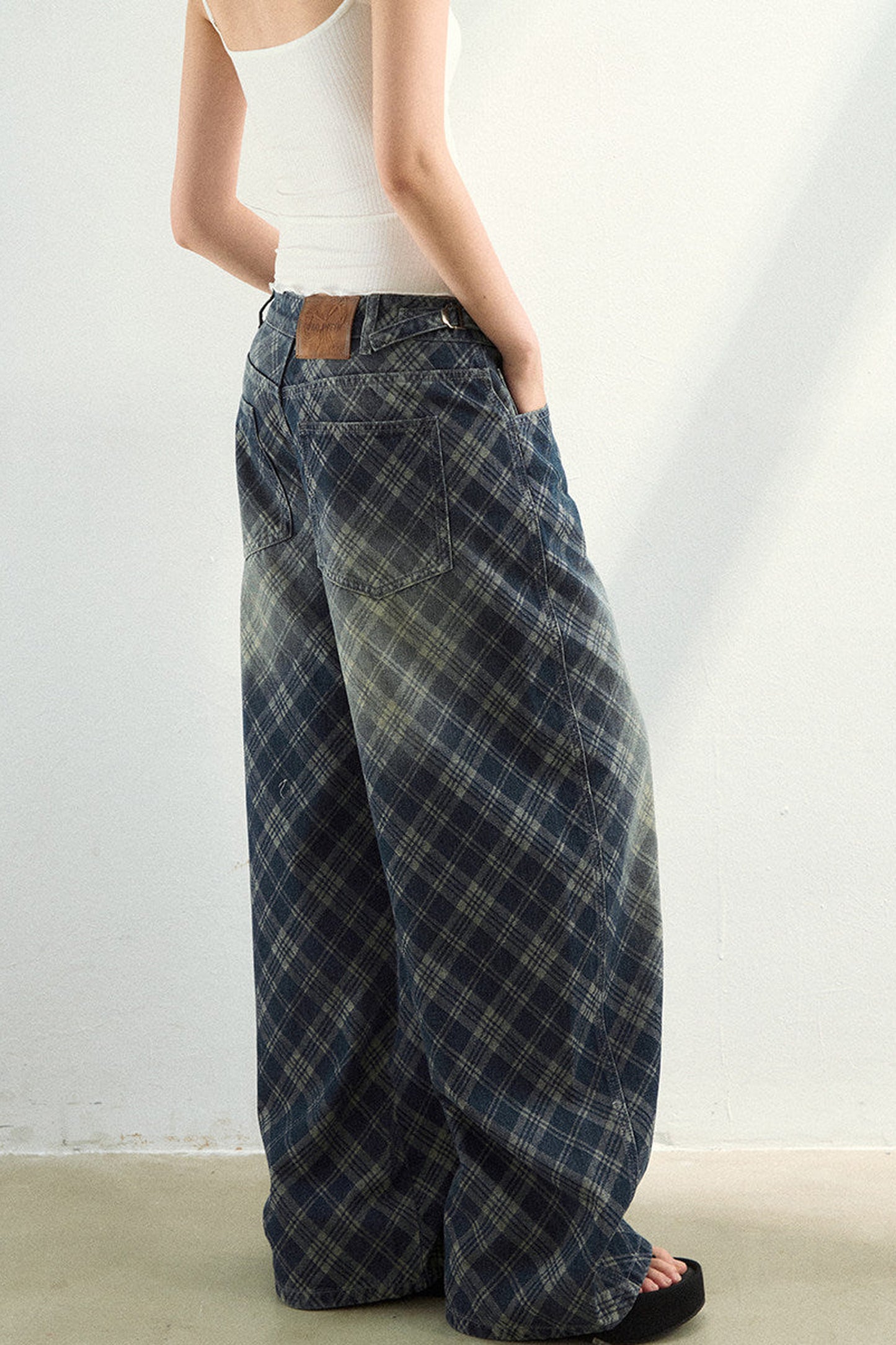 Pantaloni in denim a quadri sfumati
