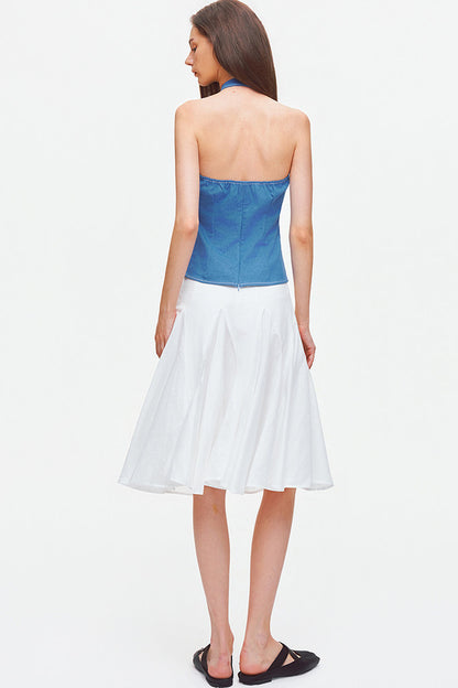 Top all'americana in denim con cuciture a contrasto e schiena scoperta