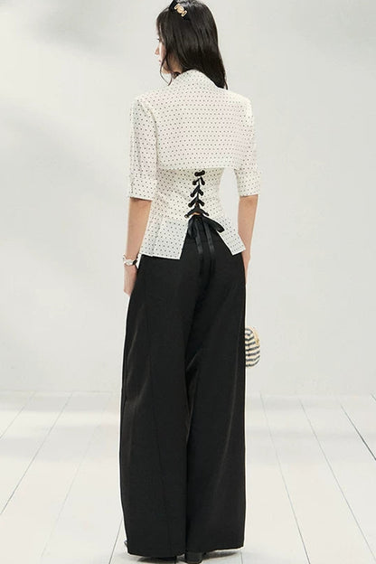 Blusa a pois con volant