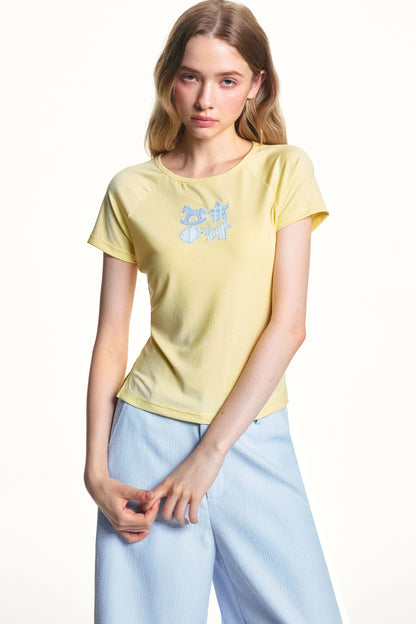 Maglia in lyocell con applicazione dallo stile fanciullesco