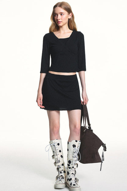 Conjunto de top de punto jacquard texturizado y falda
