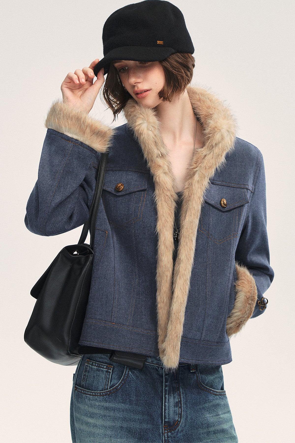 Jeansblaue Patchwork-Jacke mit Fellrevers