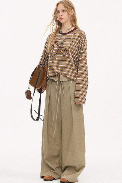Pantalon droit à rayures et empiècements