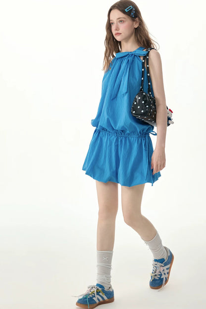 Blaues ärmelloses Kleid mit Neckholder und Schleife