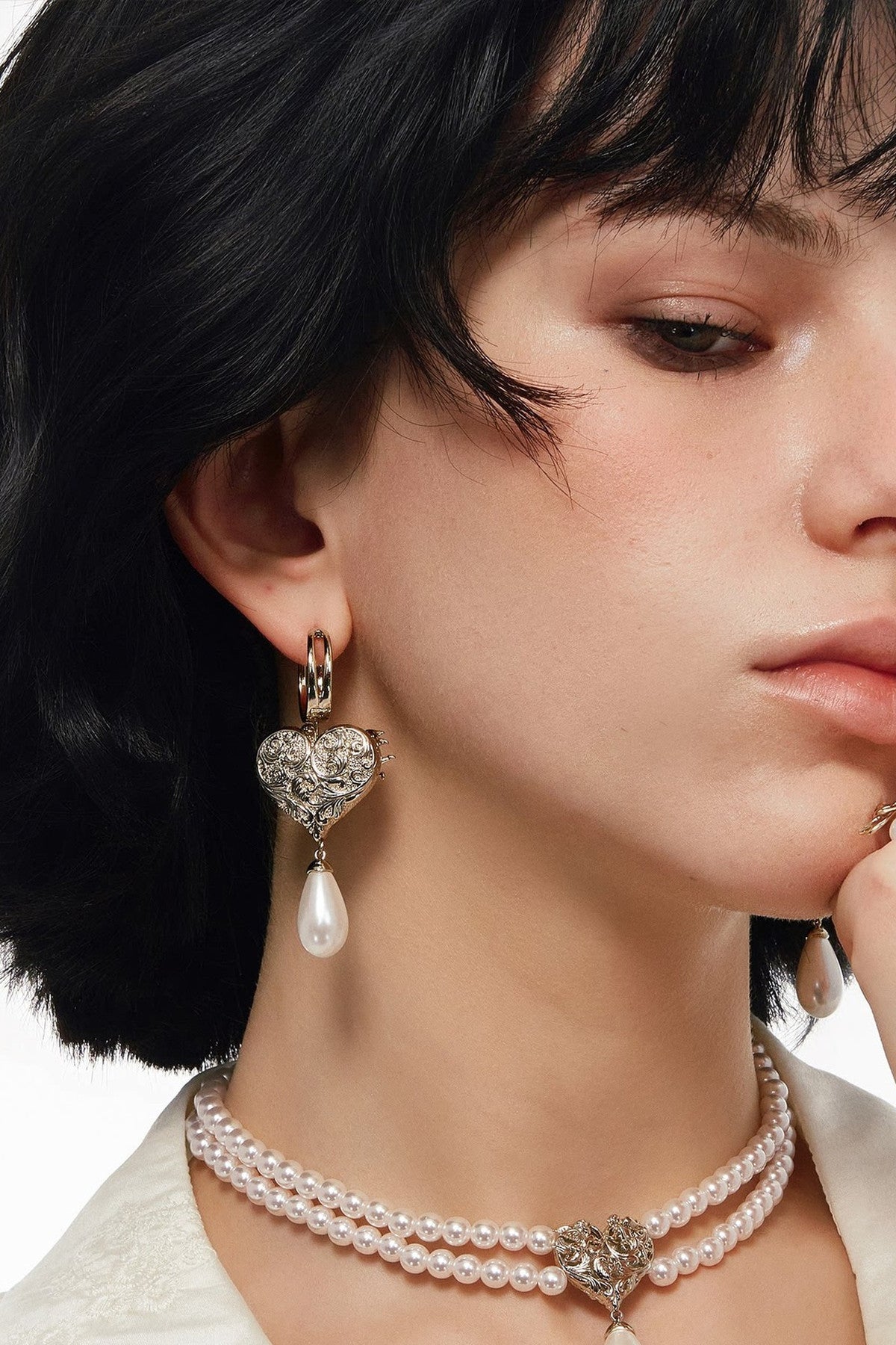 Double-Sided Rotating Heart Angel Pearl Earrings
