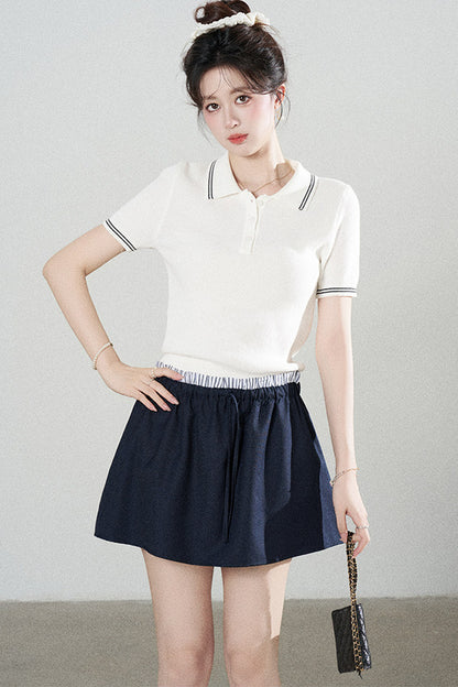 Ensemble tee-shirt polo en tricot blanc à manches courtes et jupe
