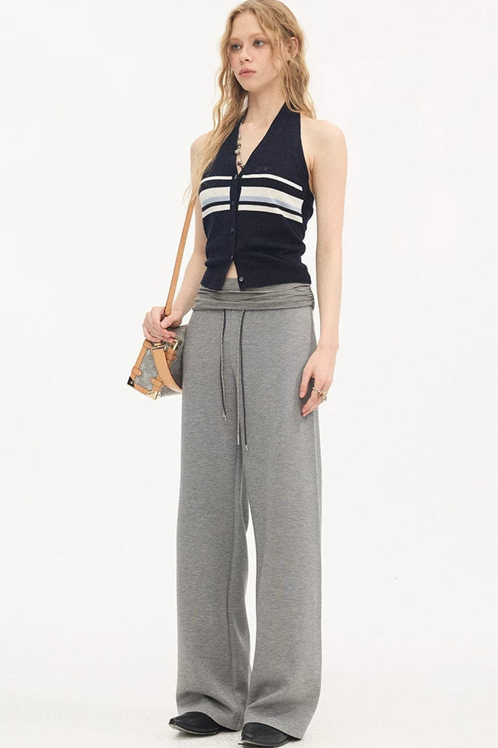 Pantalones casuales slim de cintura alta