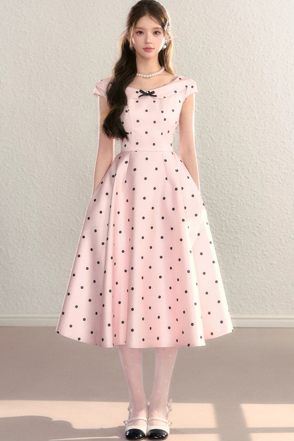 Abito francese a pois con fiocco
