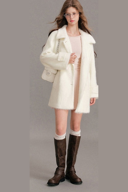 Manteau mi-long en laine imitation vison à épaules tombantes