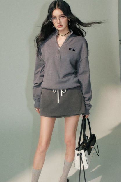 Completo a maglia grigio con top con collo alla coreana e pantaloni