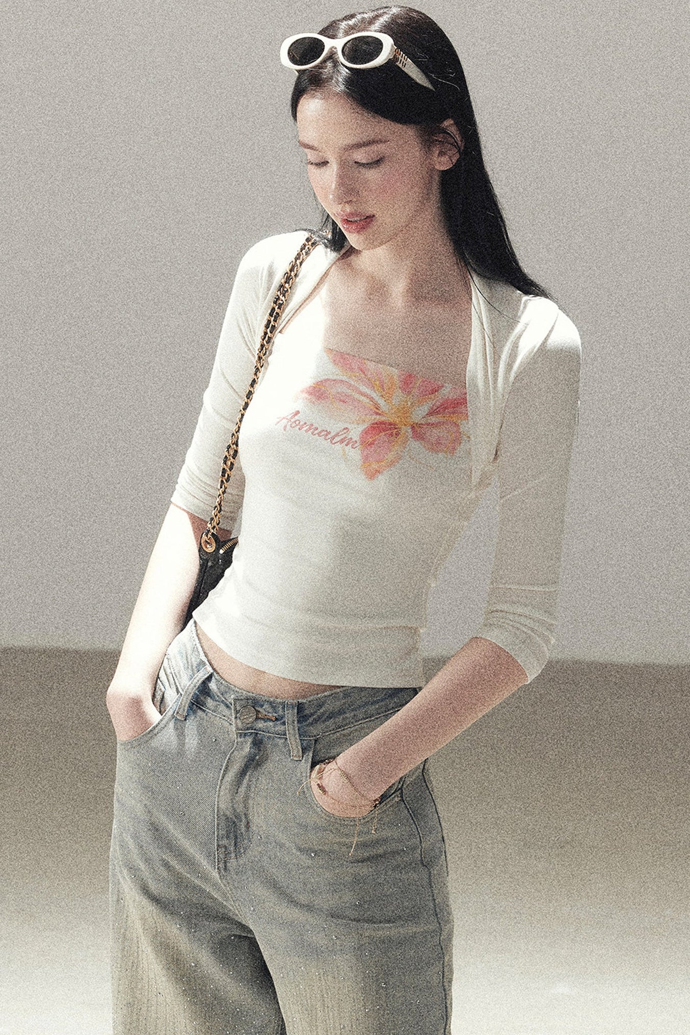 Top cardigan a maniche corte con stampa floreale