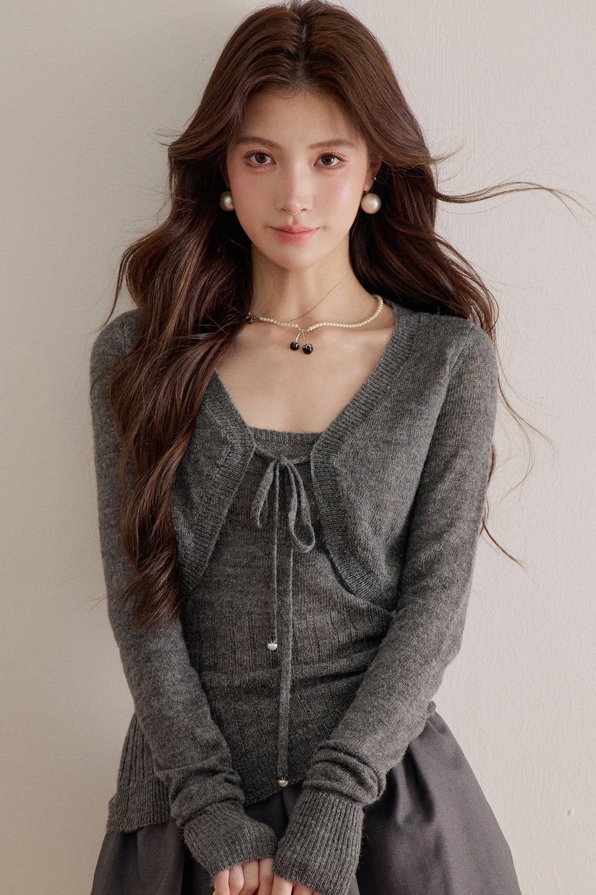 Long-Sleeve V-Neck Lace-Up Knit Sweater