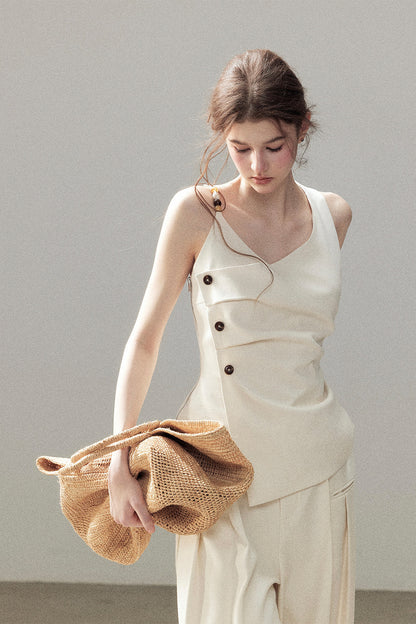 Completo con top smanicato con spalle a nuvola e pantaloni