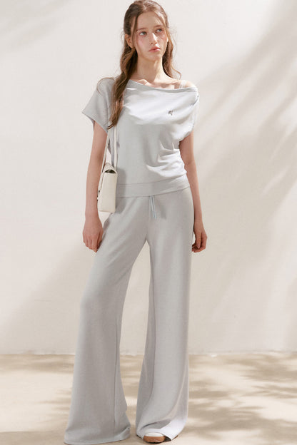 Conjunto de camiseta asimétrica y pantalones de capa de aire