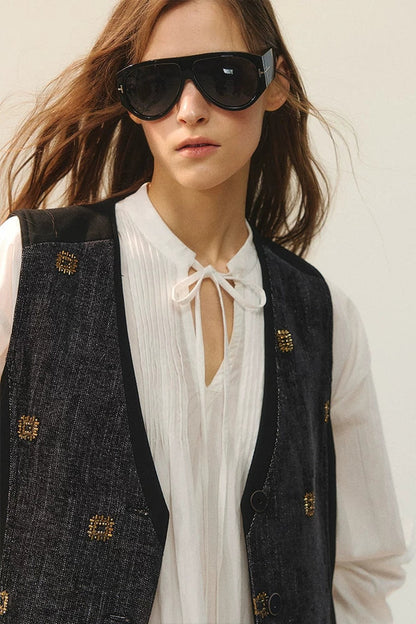 Completo rétro con gilet e gonna con perline