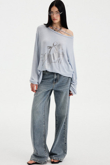 Top con strass effetto distressed con spalle scoperte