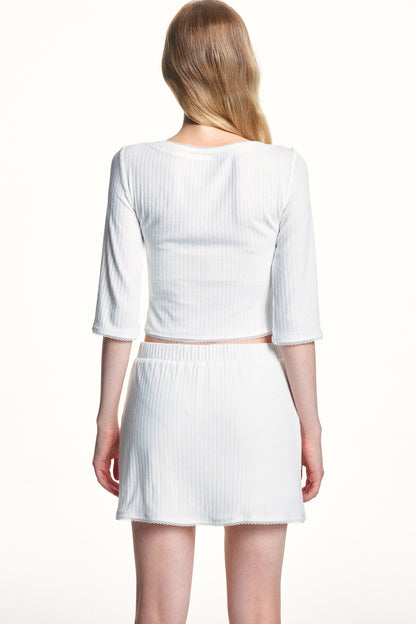 Conjunto de top de punto jacquard texturizado y falda