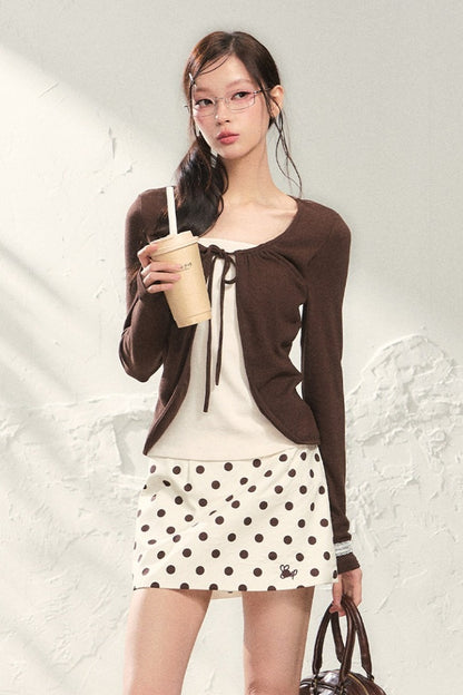 Conjunto de top de punto de manga larga y falda