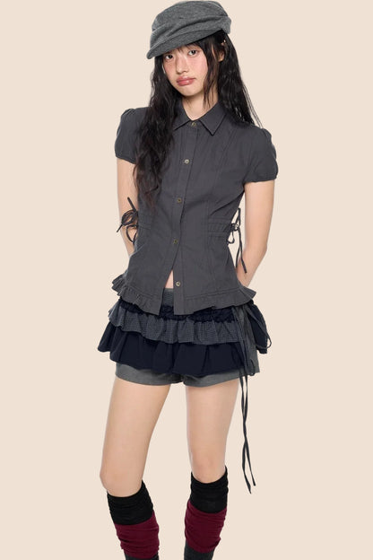Blouse à manches bouffantes avec lacets