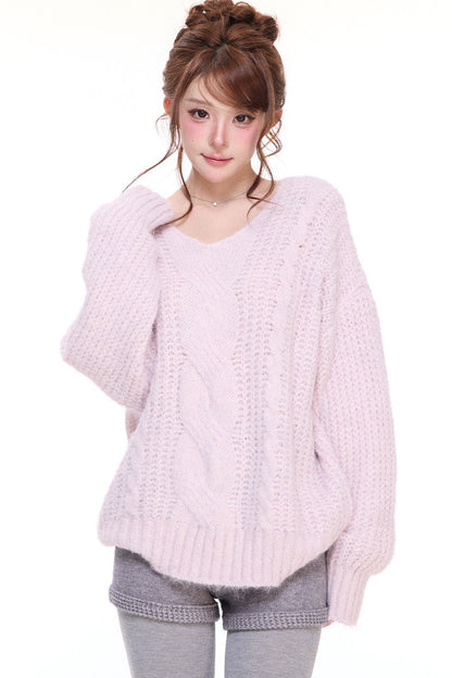 Pull ample en maille torsadée à col V