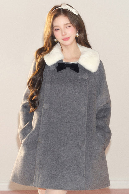 Manteau en laine avec nœud en velours