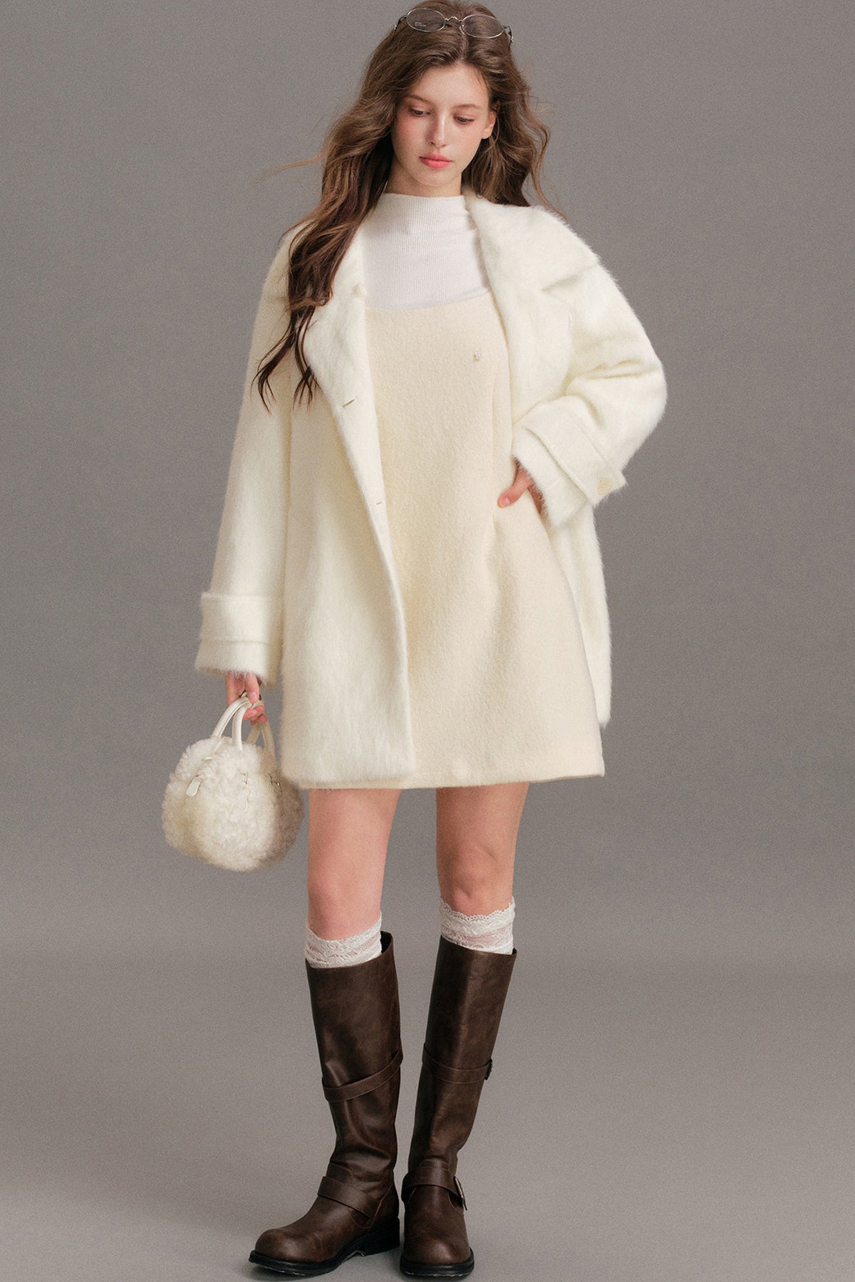 Manteau mi-long en laine imitation vison à épaules tombantes
