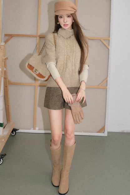 Completo retrò a maglia a trecce con maglione e pantaloncini