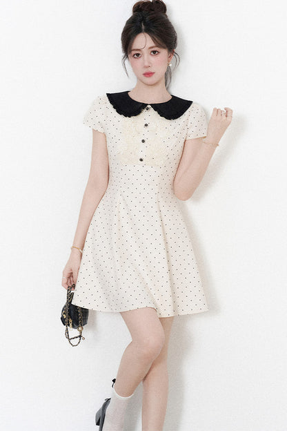 Robe trapèze à pois avec col Claudine