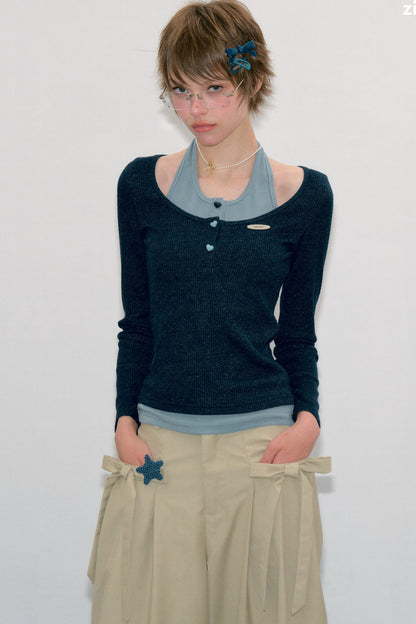 Top in maglia blu a maniche lunghe effetto stratificato