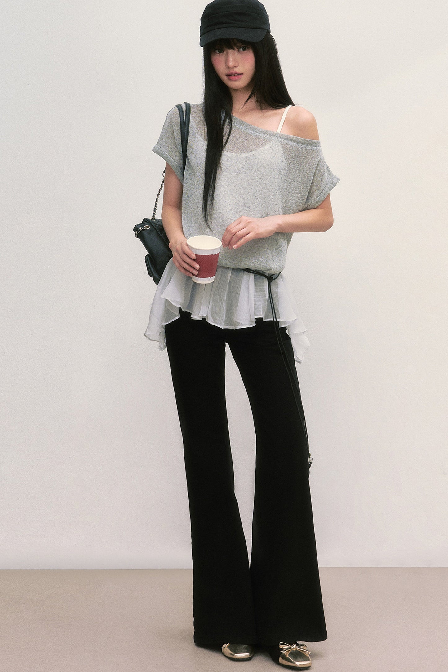 Top con inserti e spalle scoperte