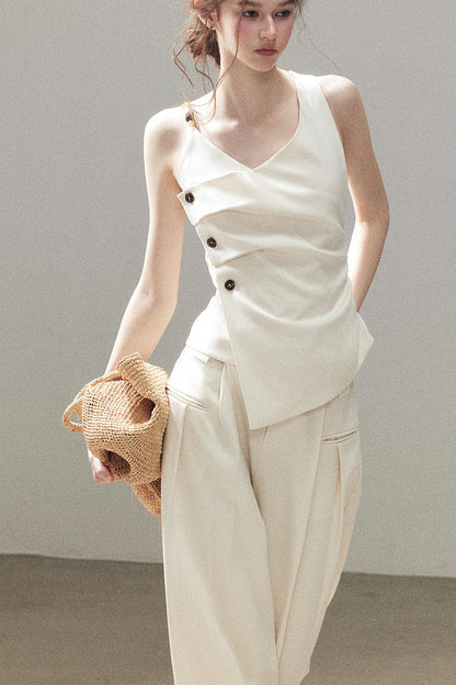 Completo con top smanicato con spalle a nuvola e pantaloni