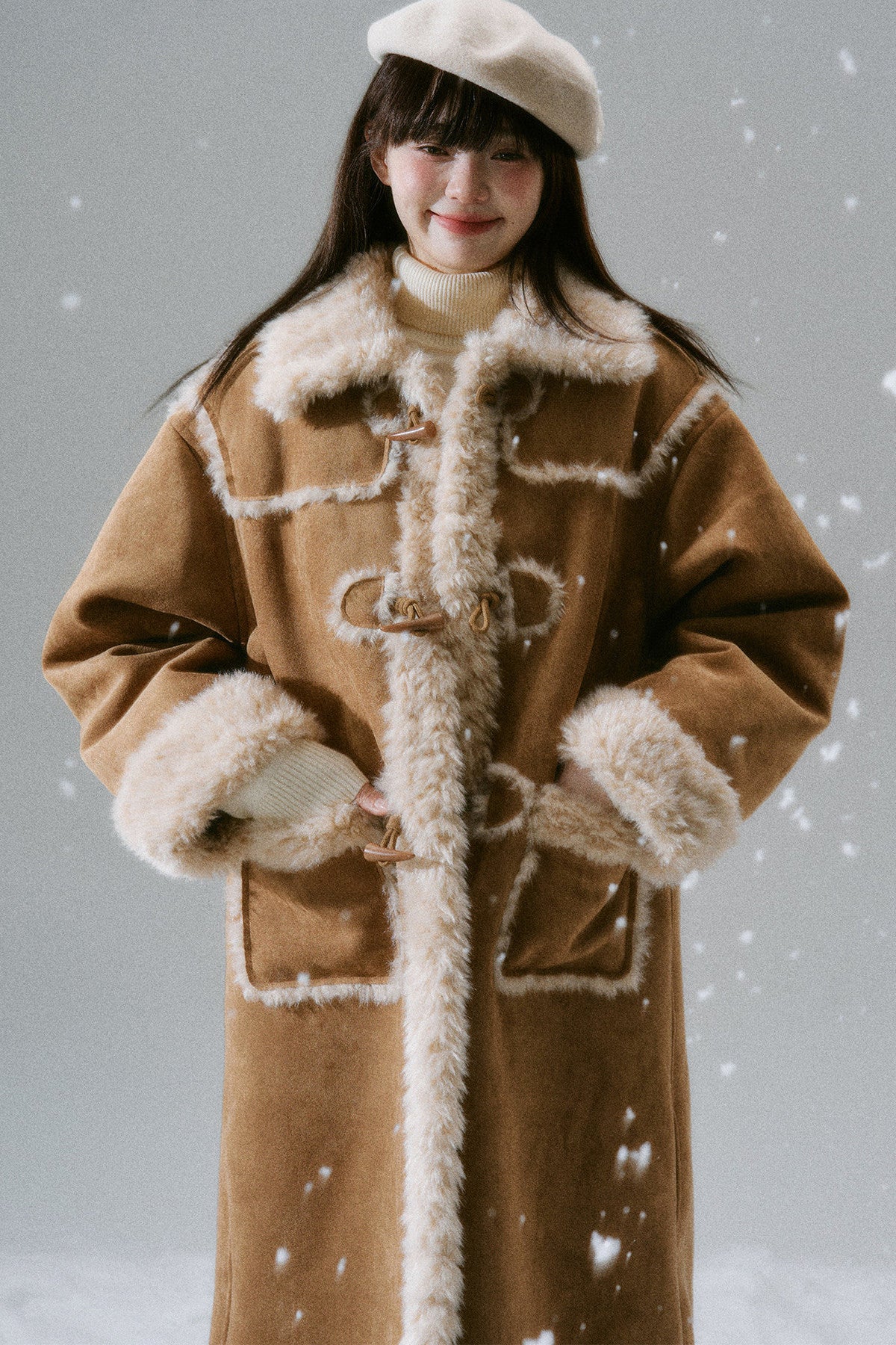 Manteau long à boutons en corne