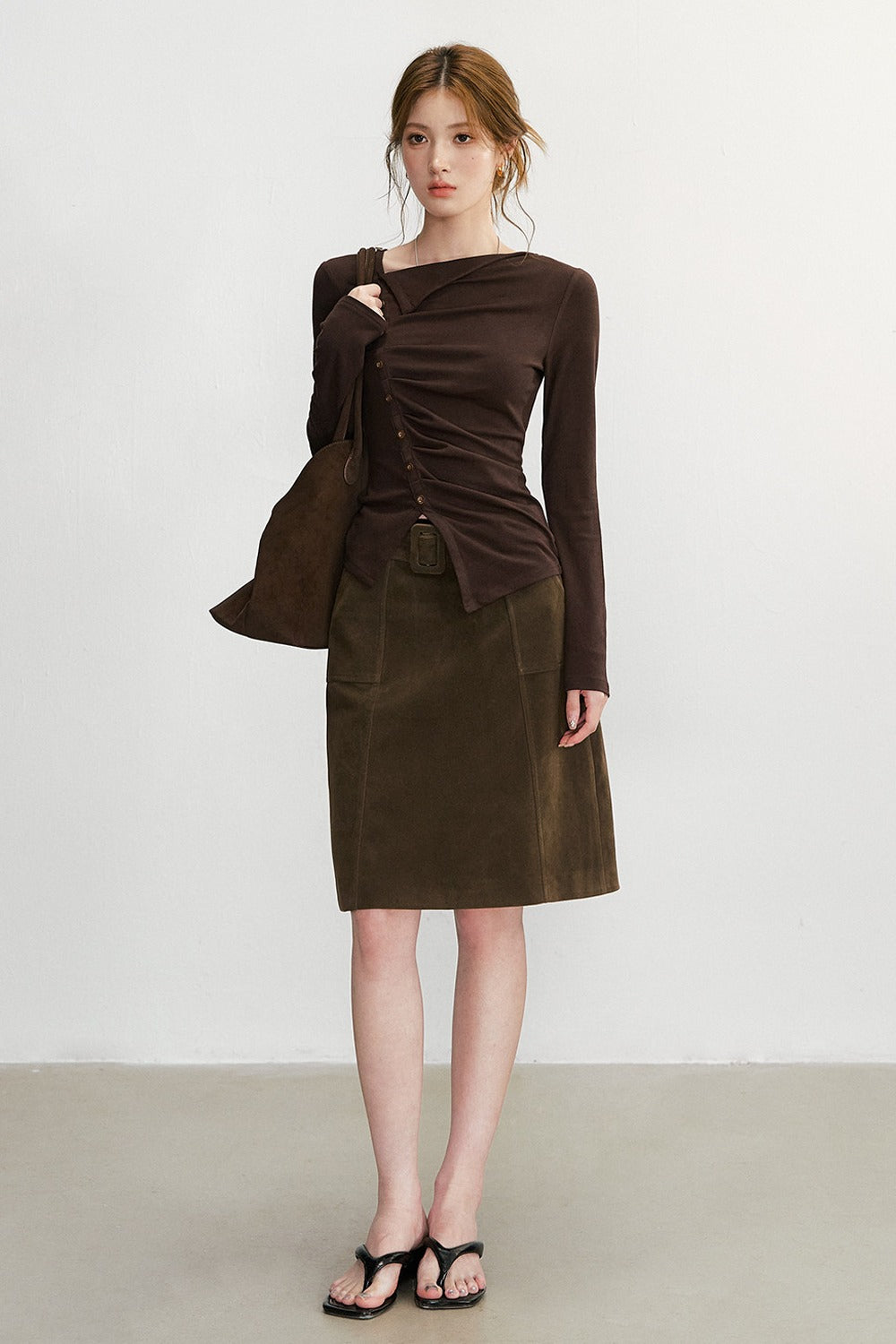 Asymmetrisches langärmeliges Strickoberteil