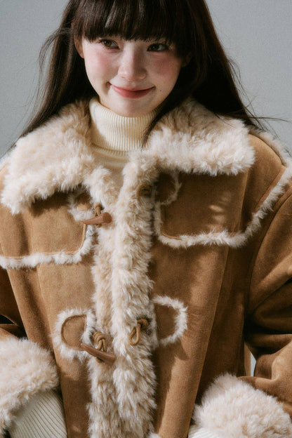 Manteau long à boutons en corne